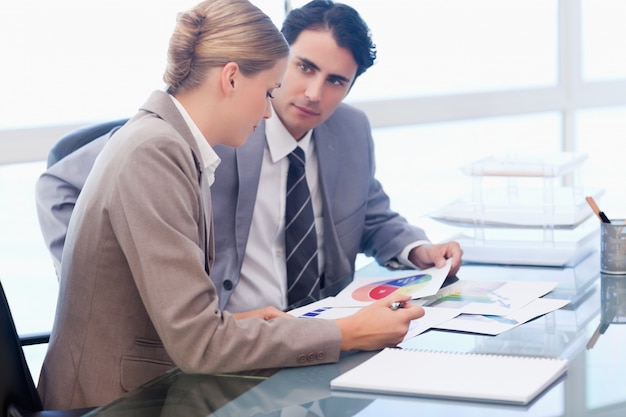 Organized charitable giving documentation and philanthropic records on a refined surface