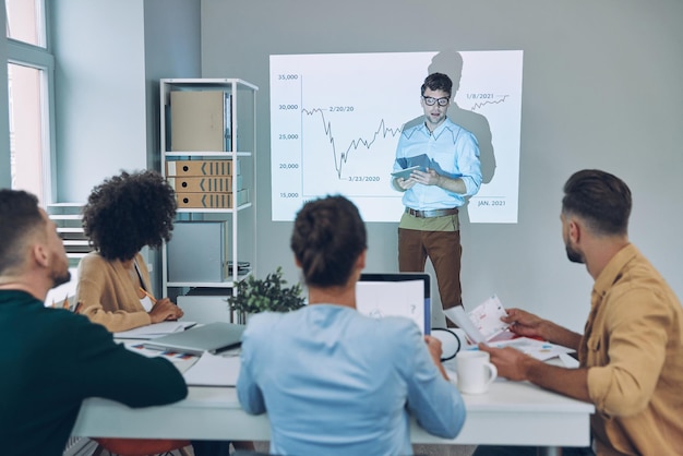 Quiet study — open ledger on a desk at dusk, organized with care